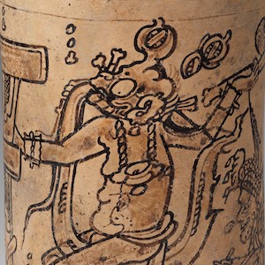 Cup inscribed with a figure holding a ceremonial ax in one hand. 