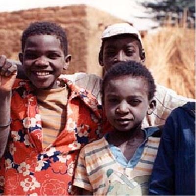Africa Speaks The image is a detail from the a photo titled "Boys at Boubon, Niger 1992" from Gallery 5 of the site. It shows three Nigerian boys posing for a picture.
